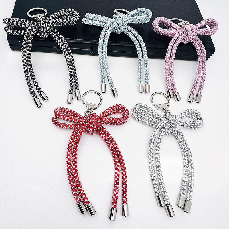 クリスタルバタフライノットペンダント 携帯電話用 手作りバッ - Phone Accessories Ideas のレビューと価格