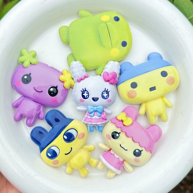 45mm漫画たまごっち両面印刷中空ビーズ、携帯電話バッグチェ - Phone Accessories Diy のレビューと価格